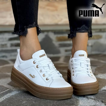 Baskets à semelle compensée PUMA® 2026