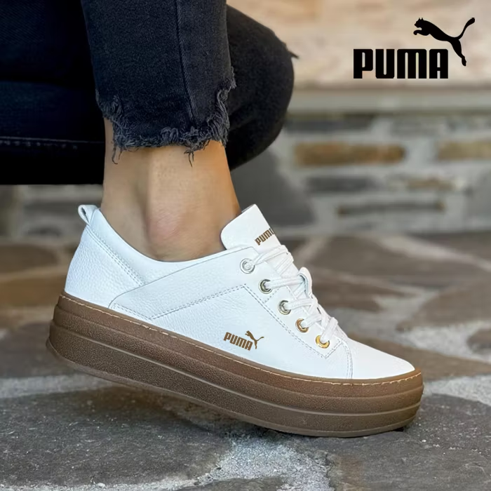 Baskets à semelle compensée PUMA® 2026